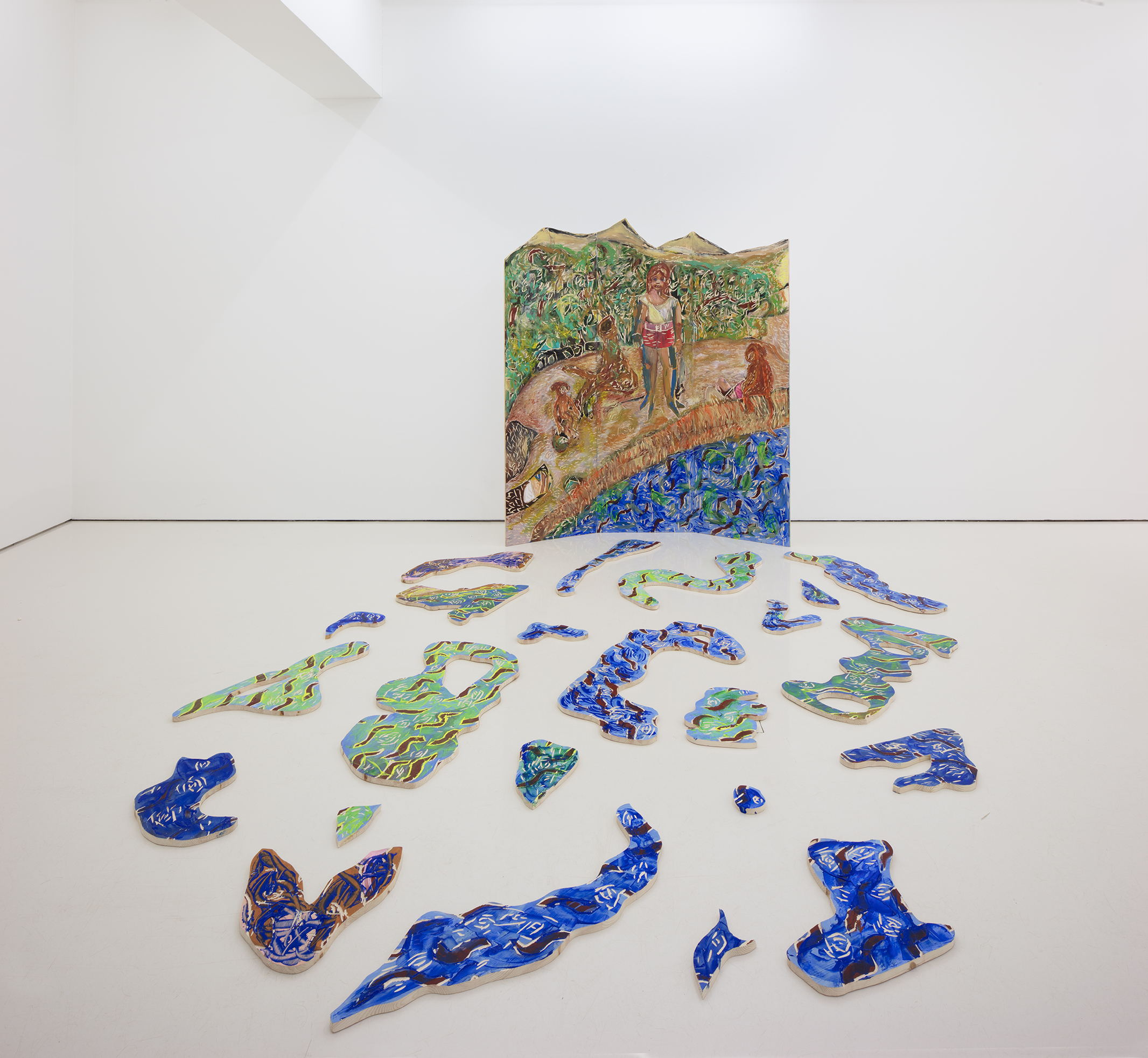 Installation view of Amuletti with Camilla Vuorenmaa: Fata Morgana (2025),painting and carving on wood, installation in 26 pieces